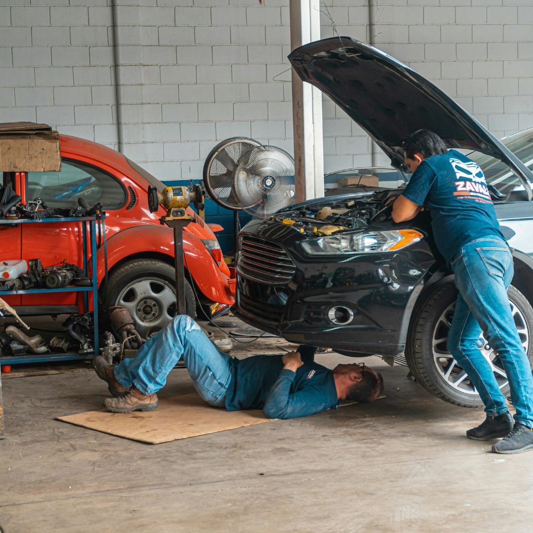 Car-Service Worker working on a car